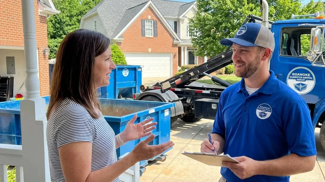 Dumpster permits in Roanoke, Virginia — a container on a city street coned and marked under the City permit Dumpster permits in Roanoke, Virginia — a container on a city street coned and marked under the City permit